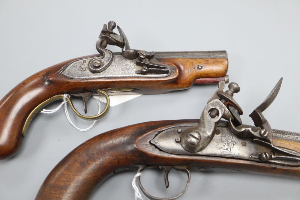Two 19th century flintlock pistols, 4in. and 11in. barrels